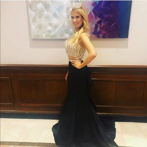 Two piece mermaid style gown with black satin skirt and high neck crystal top